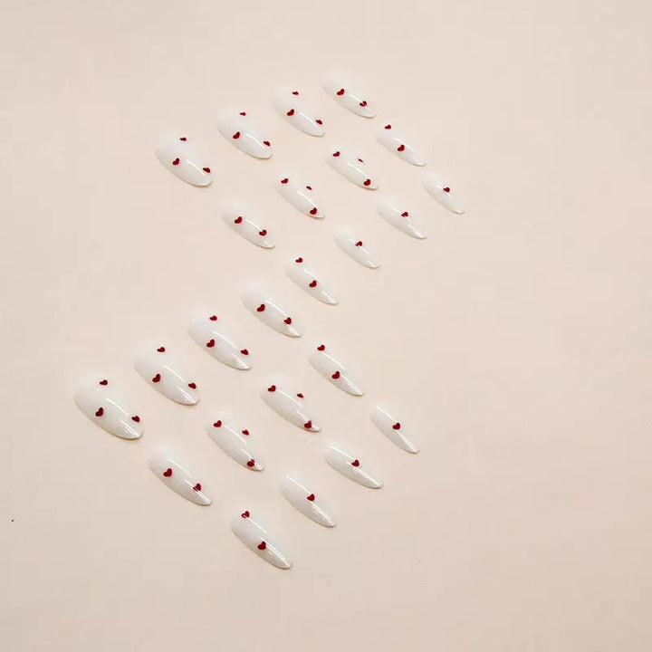Nail set with playful heart design and elegant finish Stornfield
