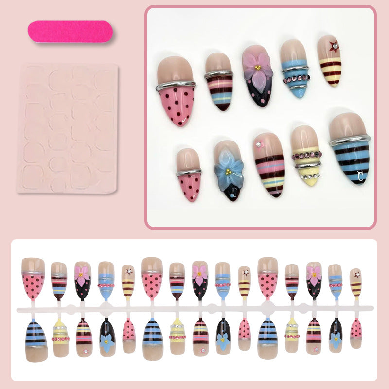 Artificial nail set with creative and playful motifs Stornfield