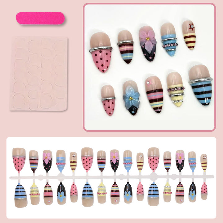 Artificial nail set with creative and playful motifs Stornfield
