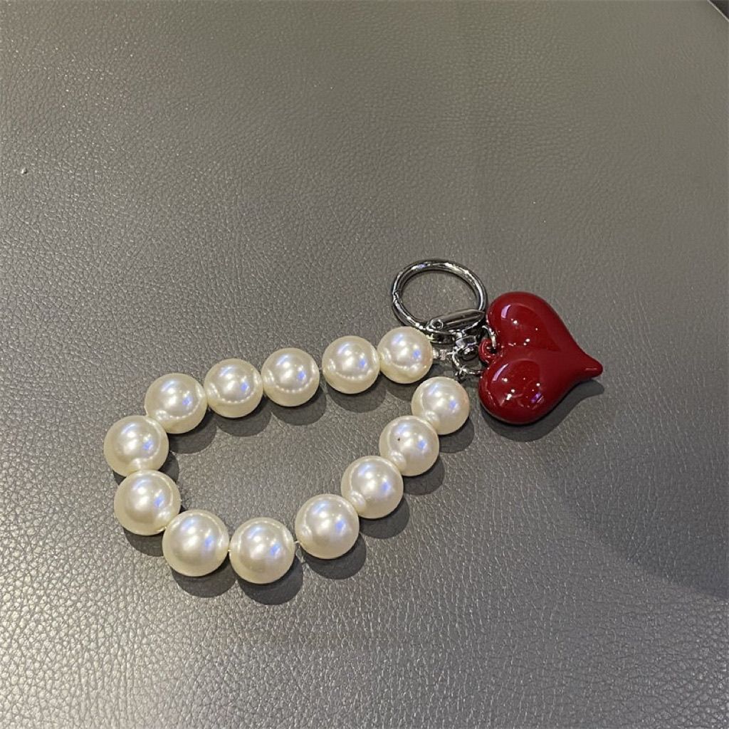 Elegant Pearl Charm Keychain Stornfield