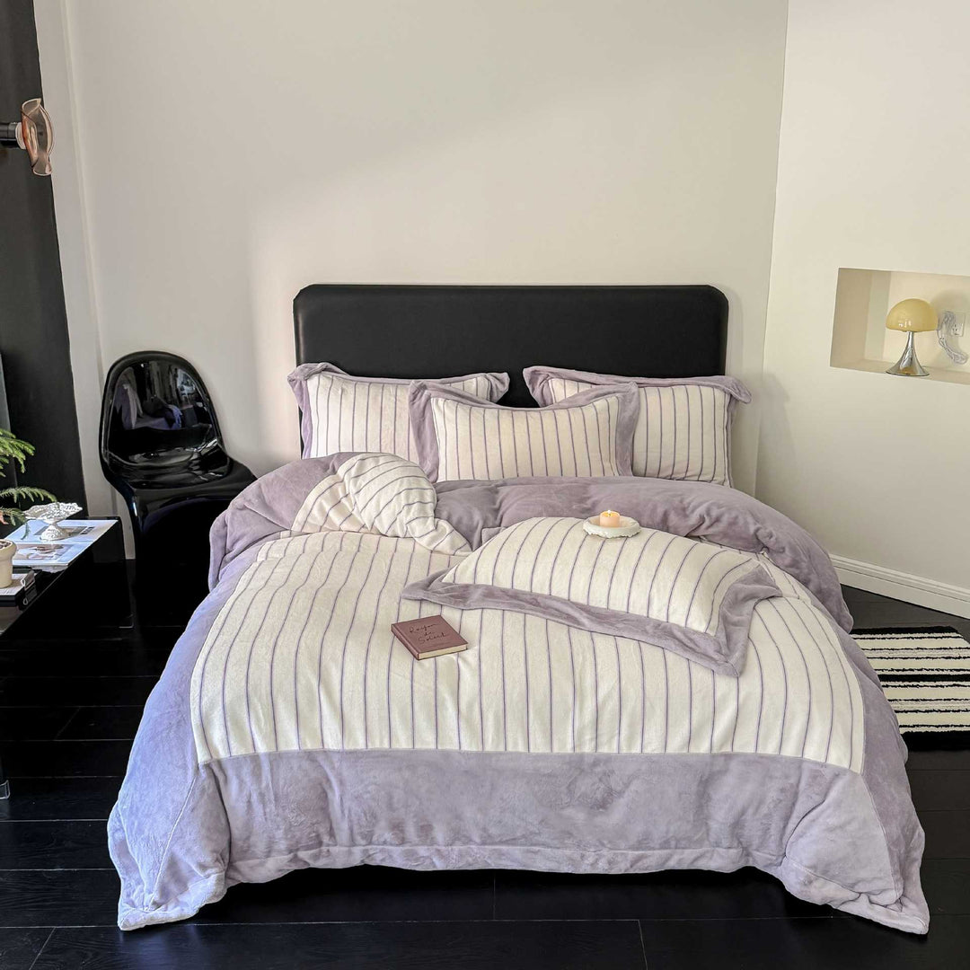 Luxurious bedding set made of striped cotton blend with velvet trim and reversible function