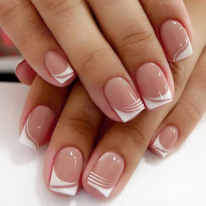 Artificial nail set with elegant French nail design and modern lines Stornfield