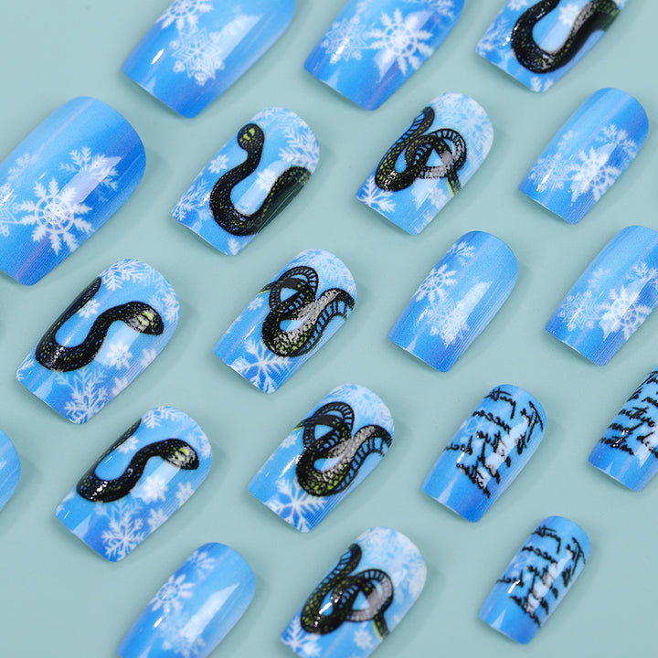 Creative art nails with snowflake and snake motif Stornfield