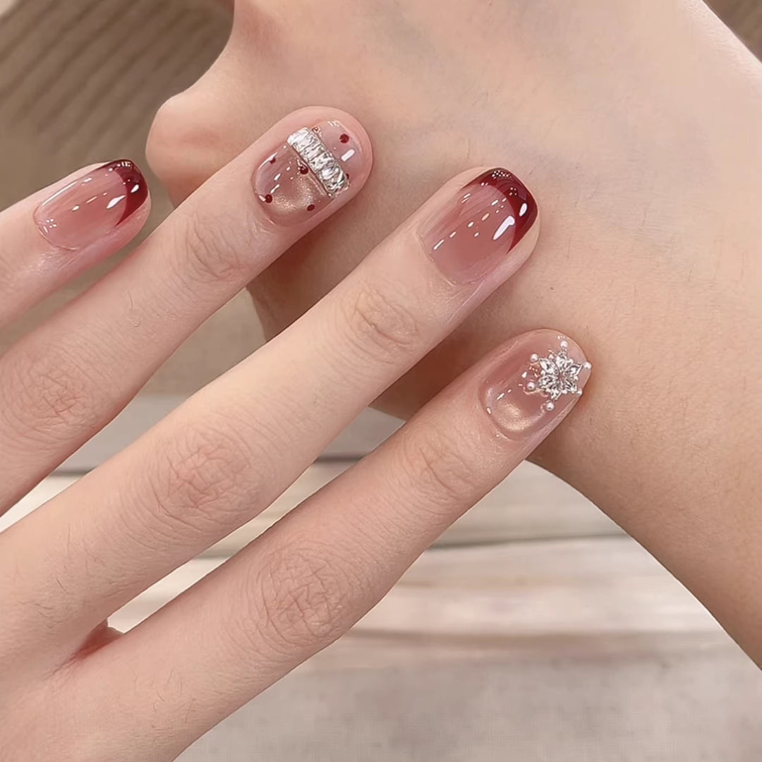 Elegant Rhinestone-Embellished Nail Art Stornfield