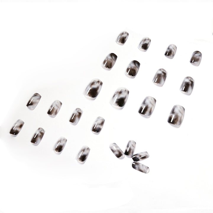 Artful Nail Extensions with Elegant Marble Design Stornfield