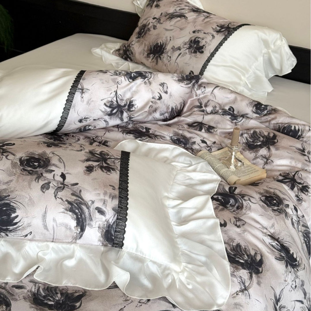Elegant bedding set made of high-quality cotton satin with ruffles, delicate lace trim, and watercolor floral print