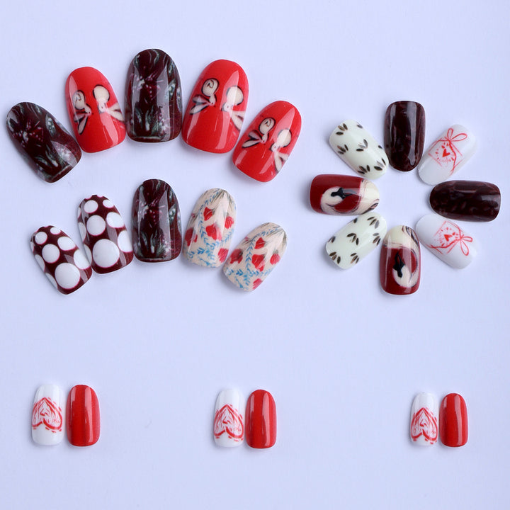 Artificial nails with romantic and playful designs Stornfield