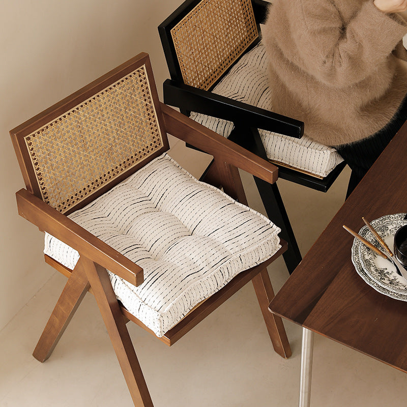 Padded square seat and floor cushion with quilted tufted padding and carrying handle Stornfield