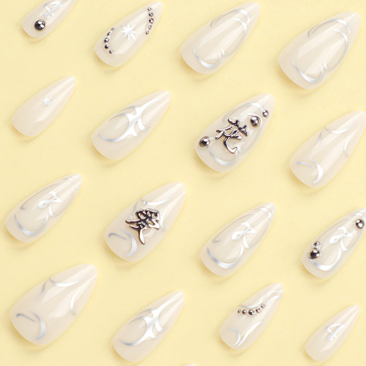 Artistic acrylic nails with elegant glitter patterns Stornfield
