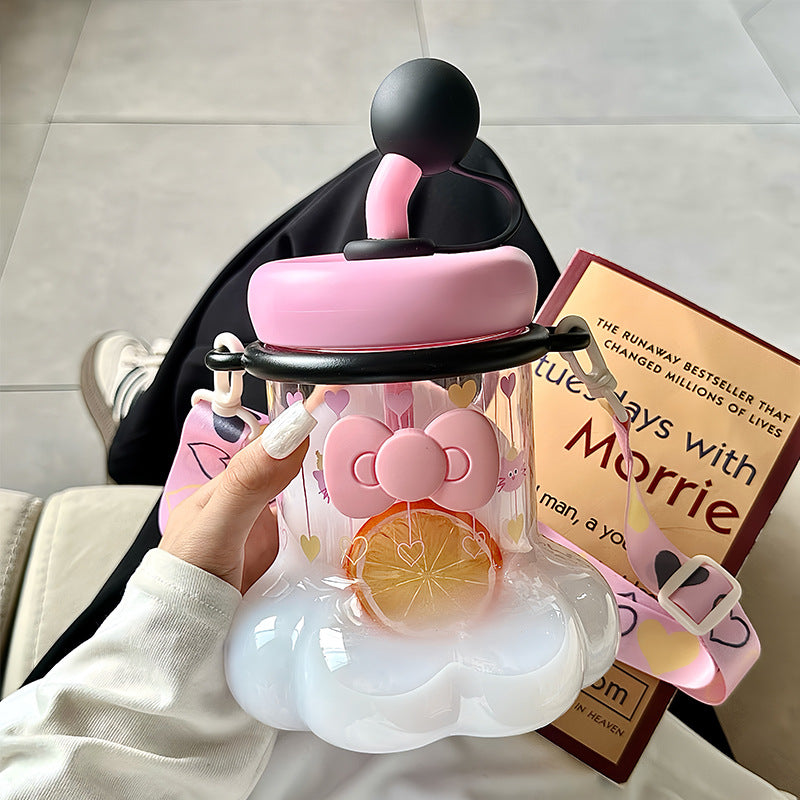 Women's water bottle with integrated silicone carrying handle and playful design Stornfield