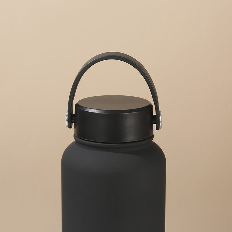 Women's double-walled insulated water bottle with practical carrying handle Stornfield