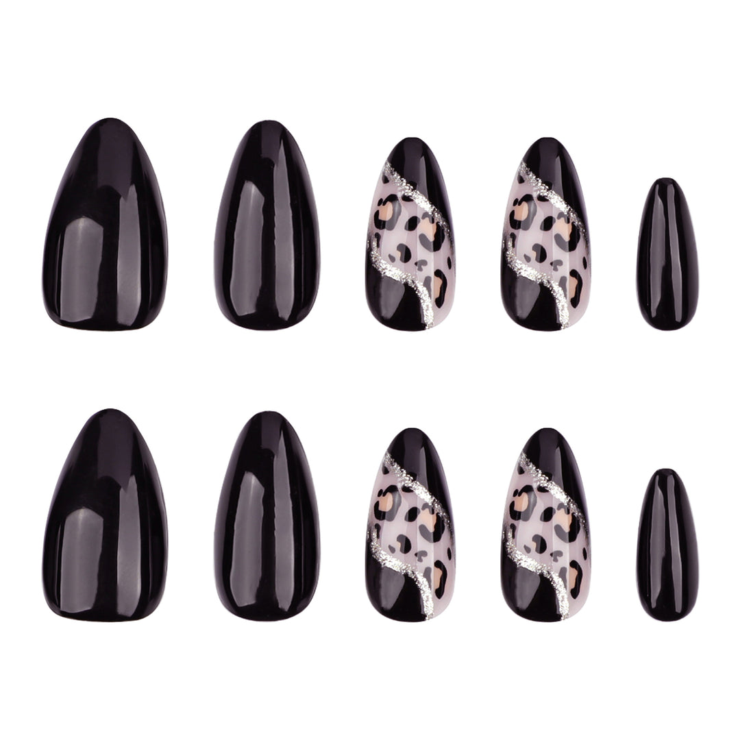 Artistic stiletto nails with leopard design and glitter effects Stornfield