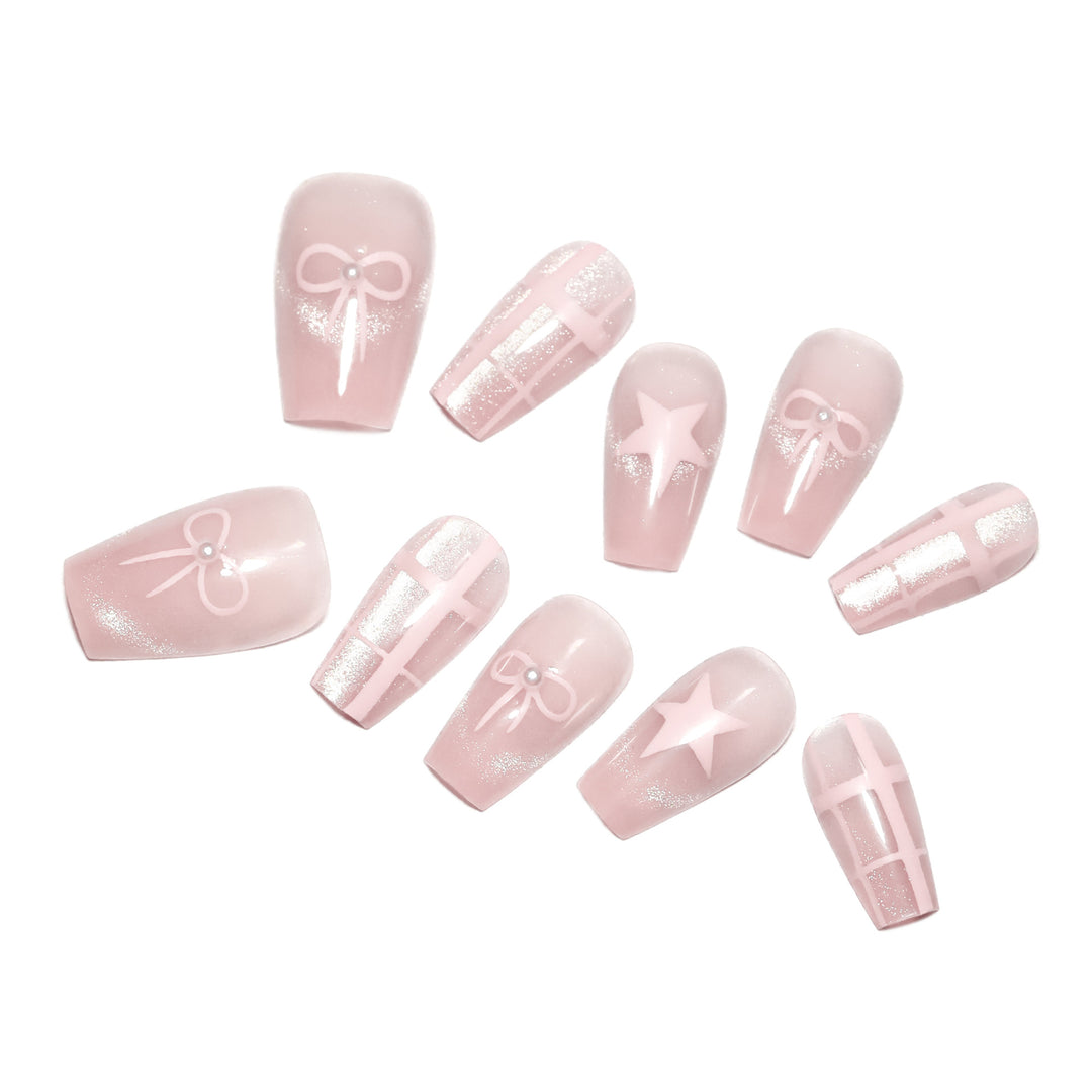 Artistic acrylic nails with elegant bow and star designs Stornfield