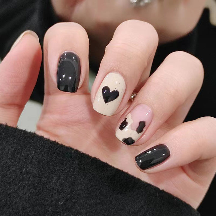 Creative nail art with heart and animal motifs Stornfield