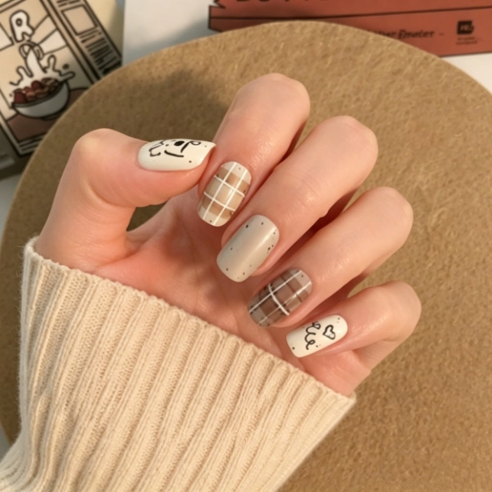 Artistic Press-On Nail Set with Unique Character Designs Stornfield