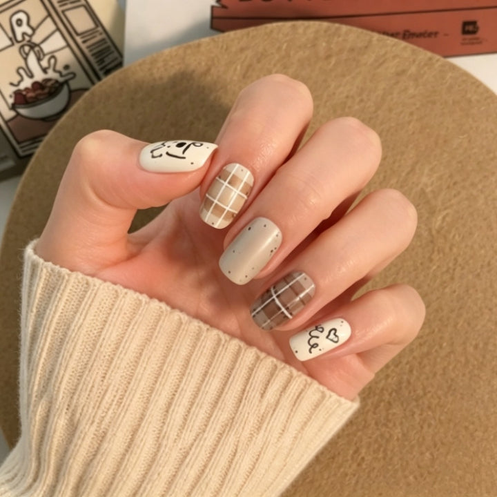Artistic Press-On Nail Set with Unique Character Designs Stornfield