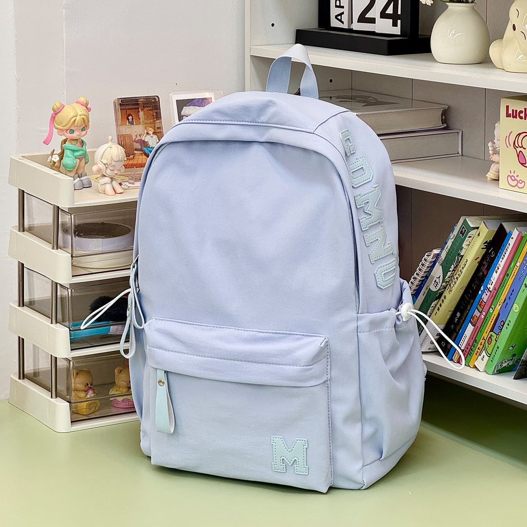 Stylish Canvas Backpack with Plush Keychain Stornfield