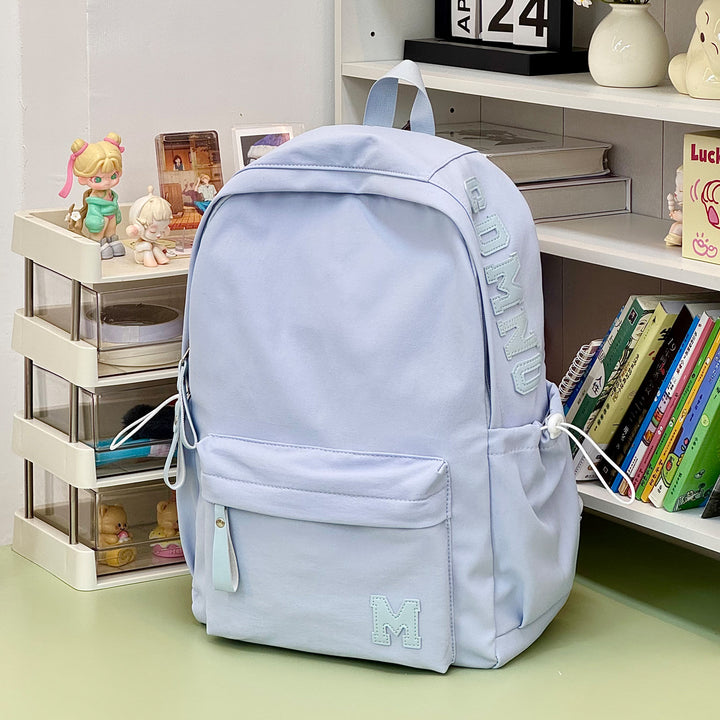 Stylish Canvas Backpack with Plush Keychain Stornfield