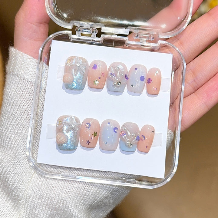 Artificial nails with sparkling galaxy design Stornfield