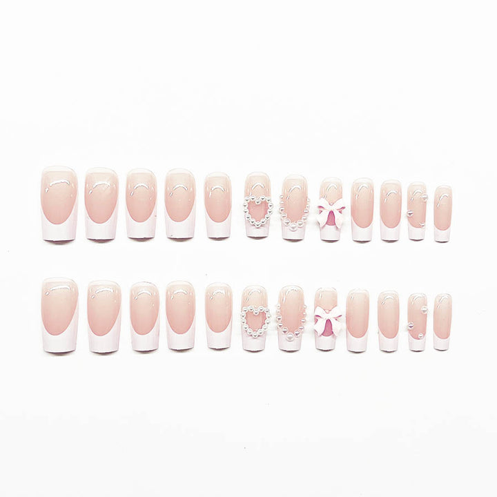Artificial nail set with elegant 3D flowers and pearl embellishments Stornfield