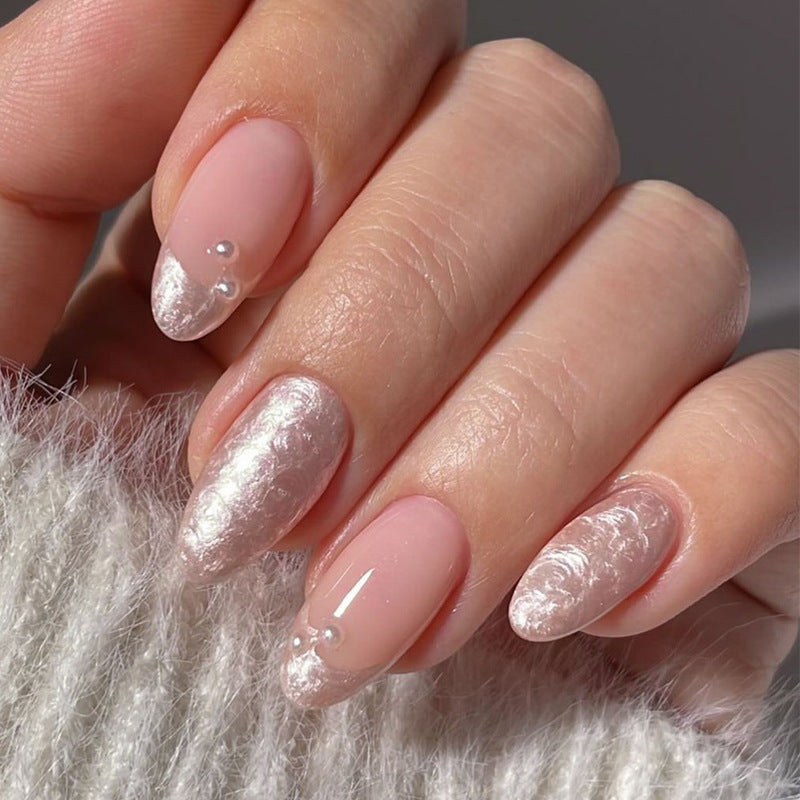 Artificial nail set with shimmering pearl and glittering accents Stornfield