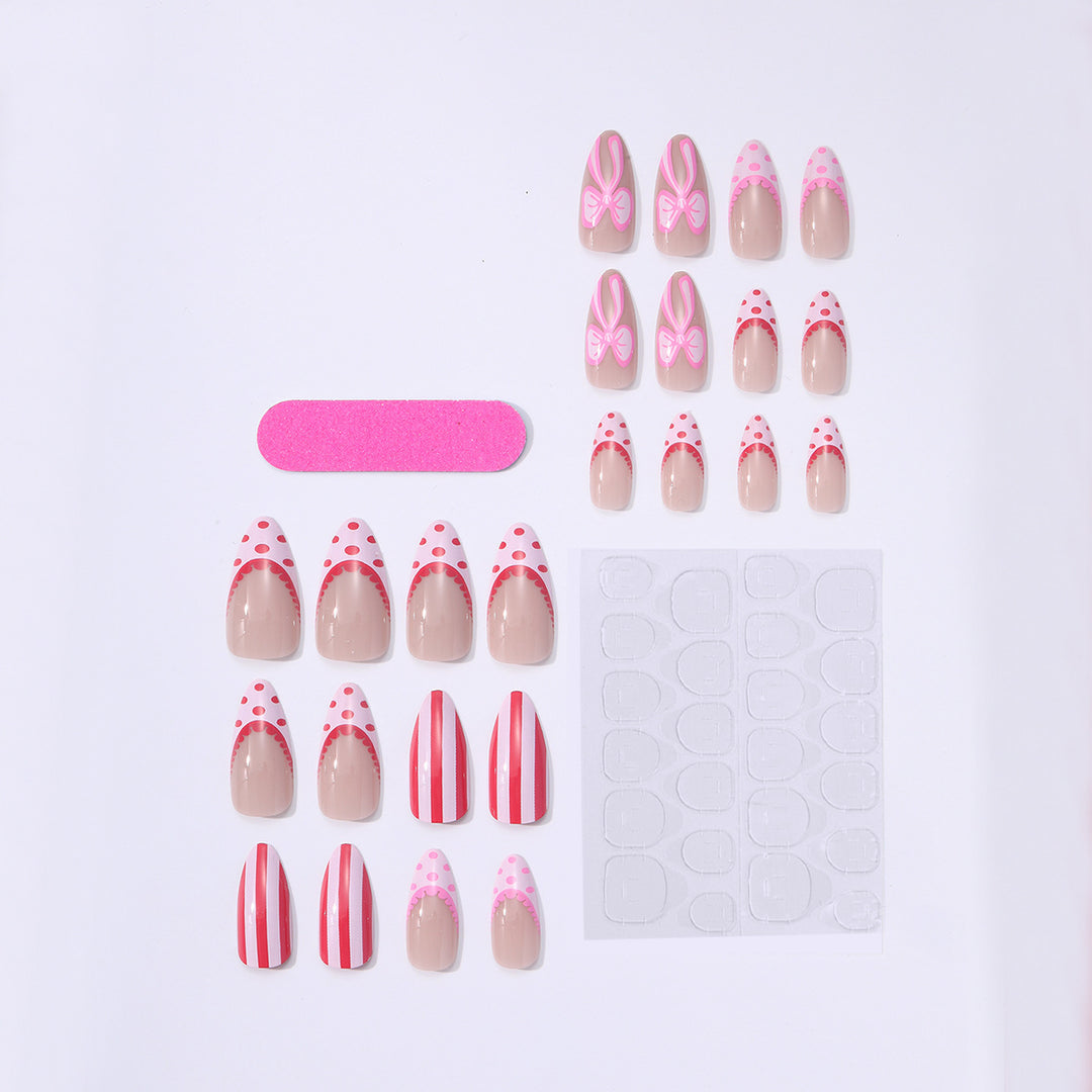 Nail set with playful bow and stripe pattern Stornfield
