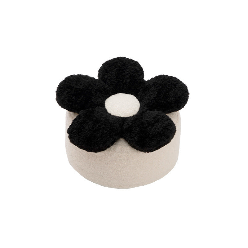 Flower-shaped floor pouf with cuddly teddy fleece surface and removable cover