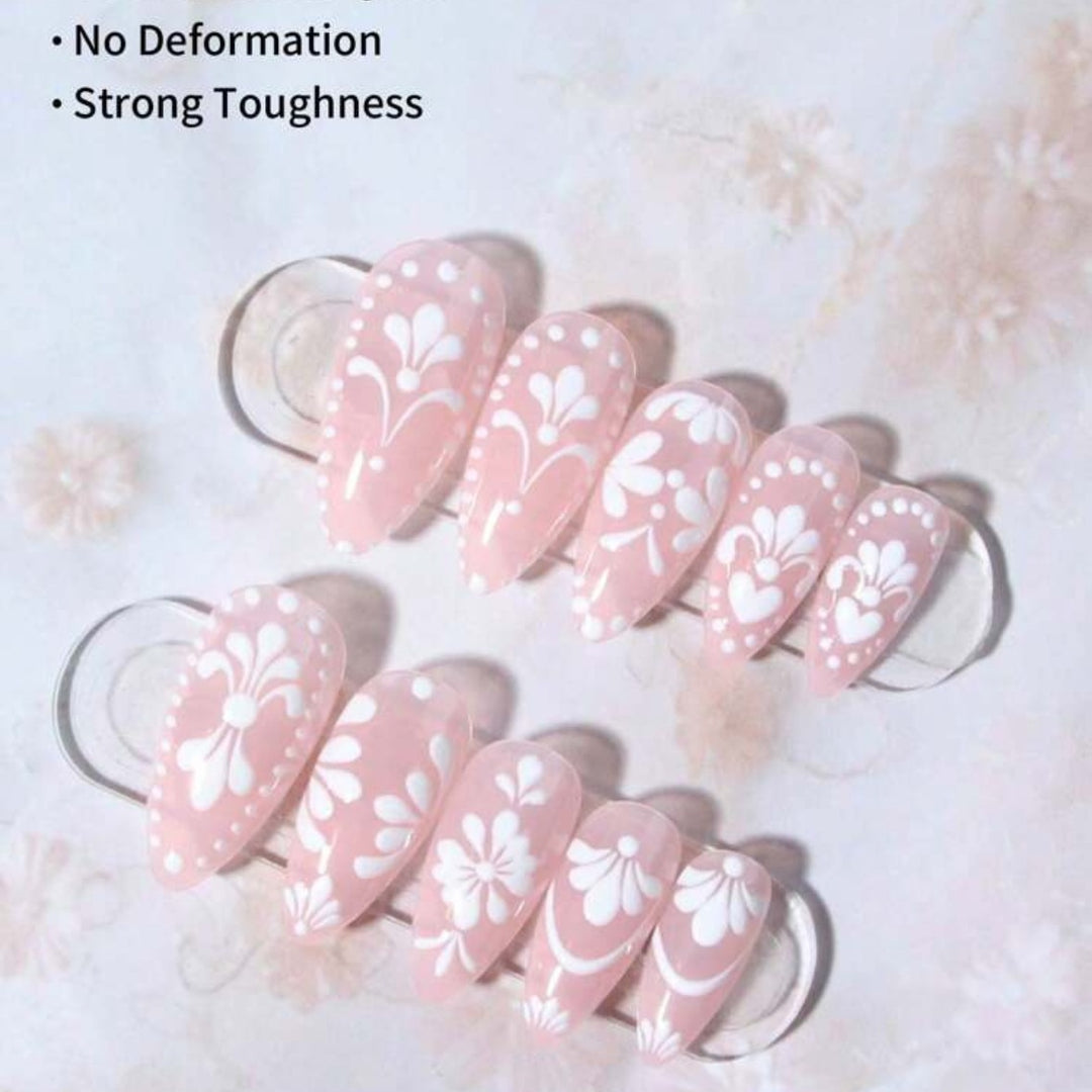 Nail art set with delicate flowers and elegant contours Stornfield