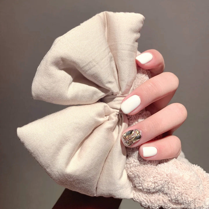 Artificial nails with glitter design and elegant accents Stornfield
