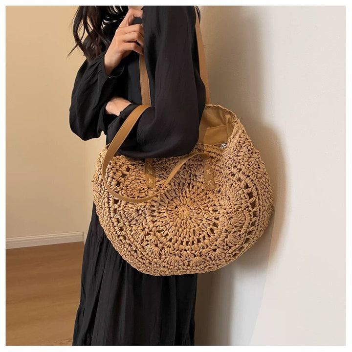 Round-woven beach bag with leather handles Stornfield