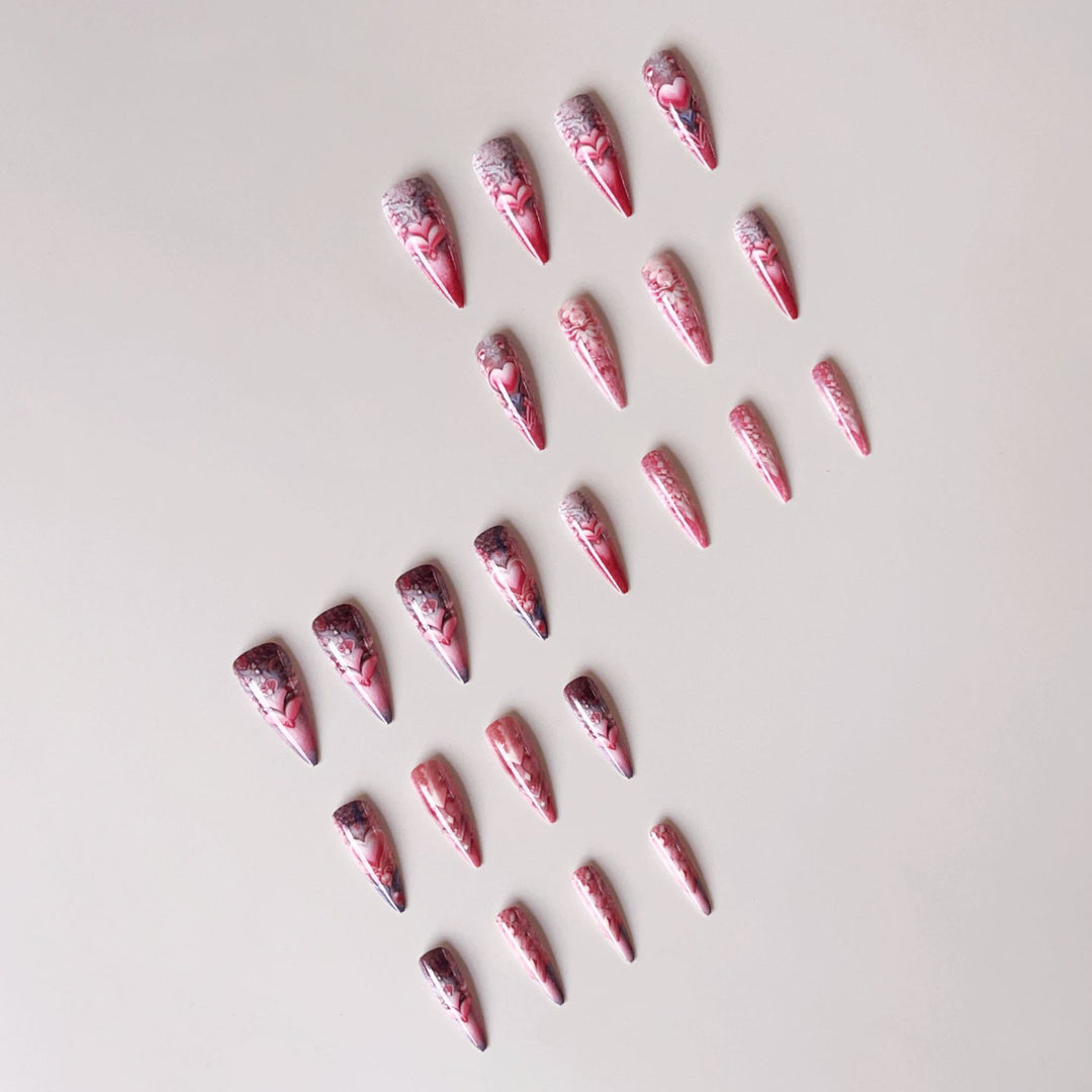 Artificial nail set with romantic 3D heart designs and luxurious embellishments Stornfield