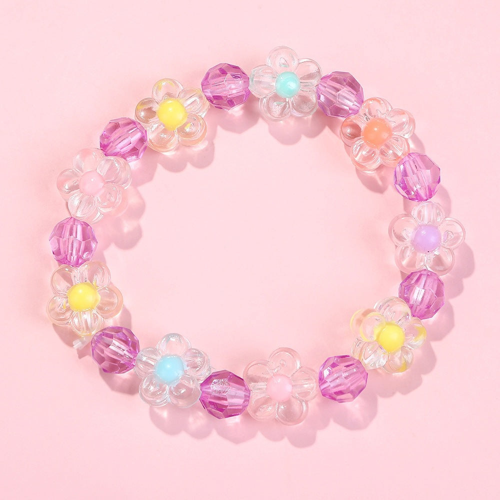 Friendship bracelet with colorful flower motifs Stornfield