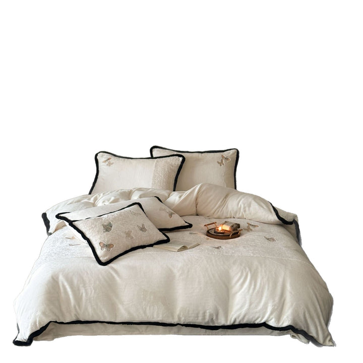 Luxurious velvet duvet cover set with embroidered pillows and contrast piping Stornfield