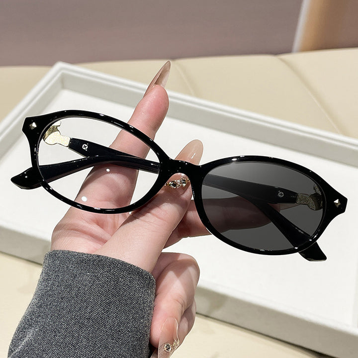 Women's fashionable optical glasses in elegant oval design with golden accents Stornfield