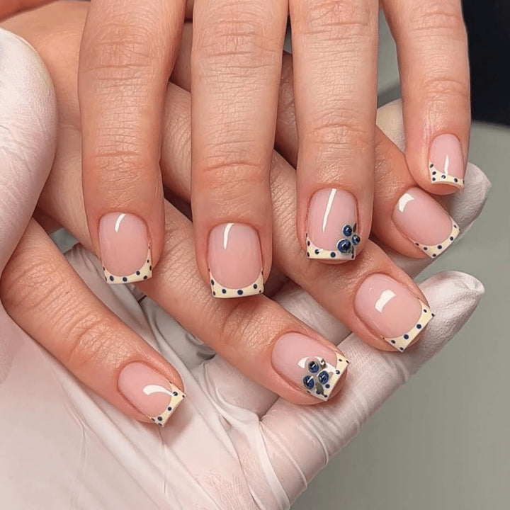 Elegantly designed nail extensions with decorative accents Stornfield