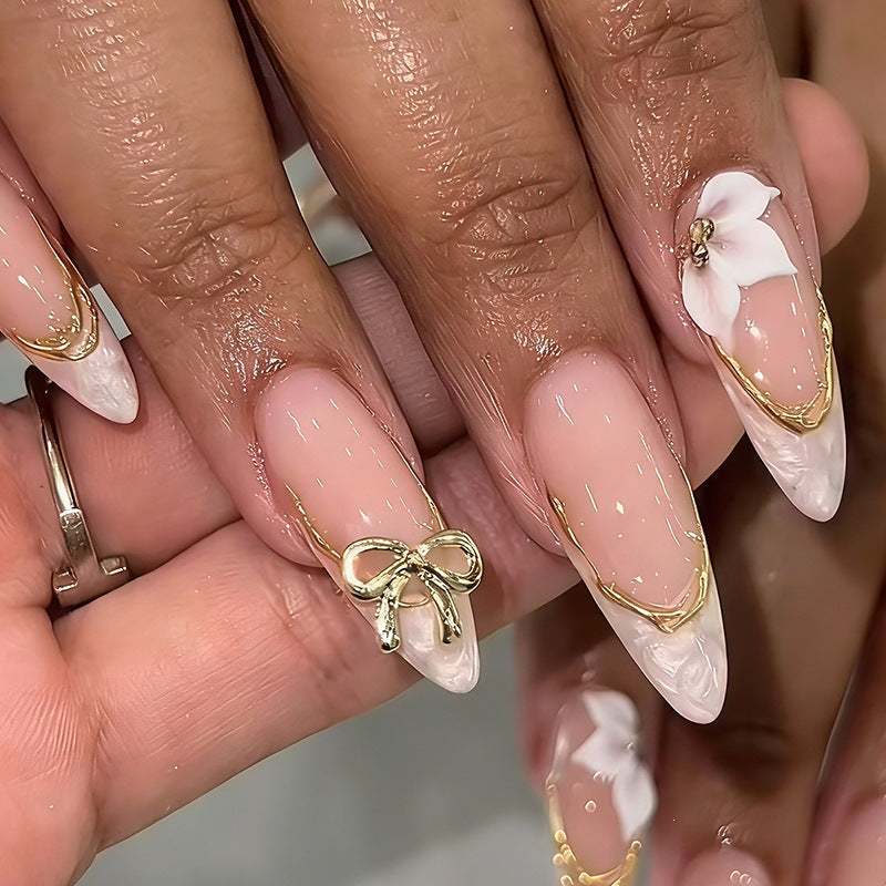 Artificial nail set with glamorous tips and stylish accents Stornfield