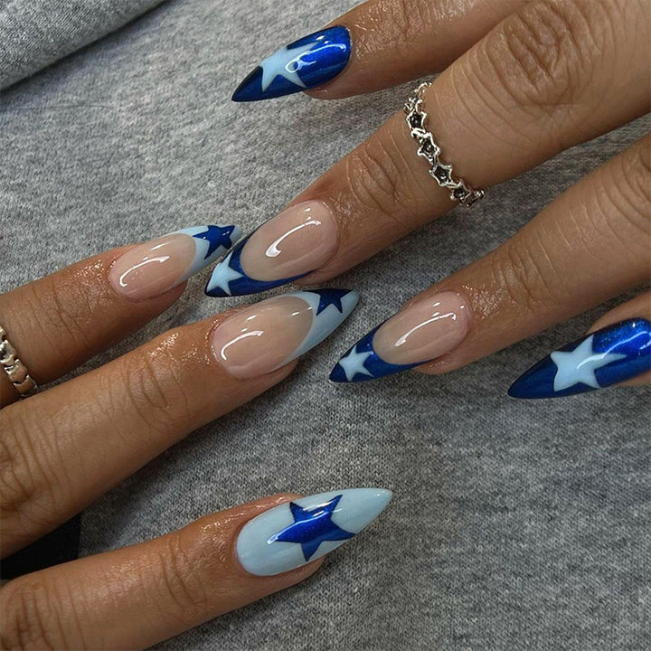 Artful stiletto nails with heart-shaped accents Stornfield