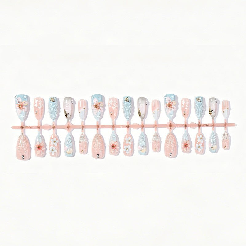 Creative nail art set with floral design and delicate decoration Stornfield