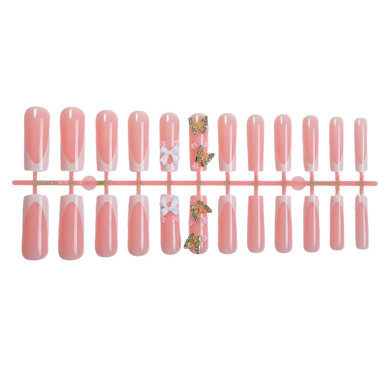 Decorative Press-On Nail Set with Floral and Butterfly Accents Stornfield