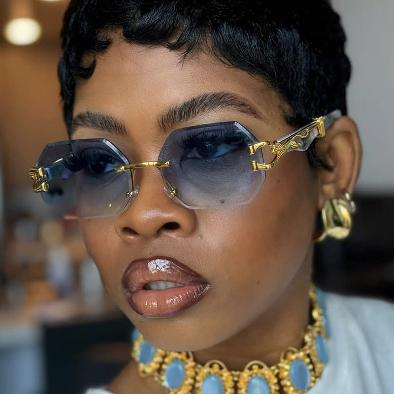 Women's fashionable sunglasses with extravagant octagonal design and golden accents Stornfield