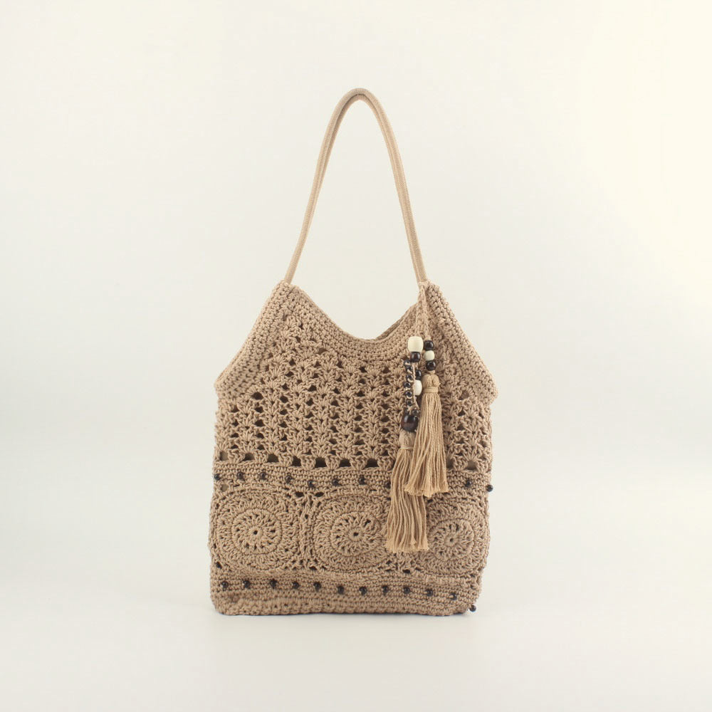 Crochet handbag with fringed accents Stornfield