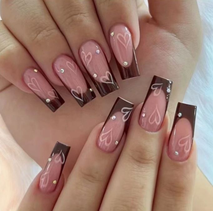 Elegant artificial nails with heart pattern and glitter accents Stornfield