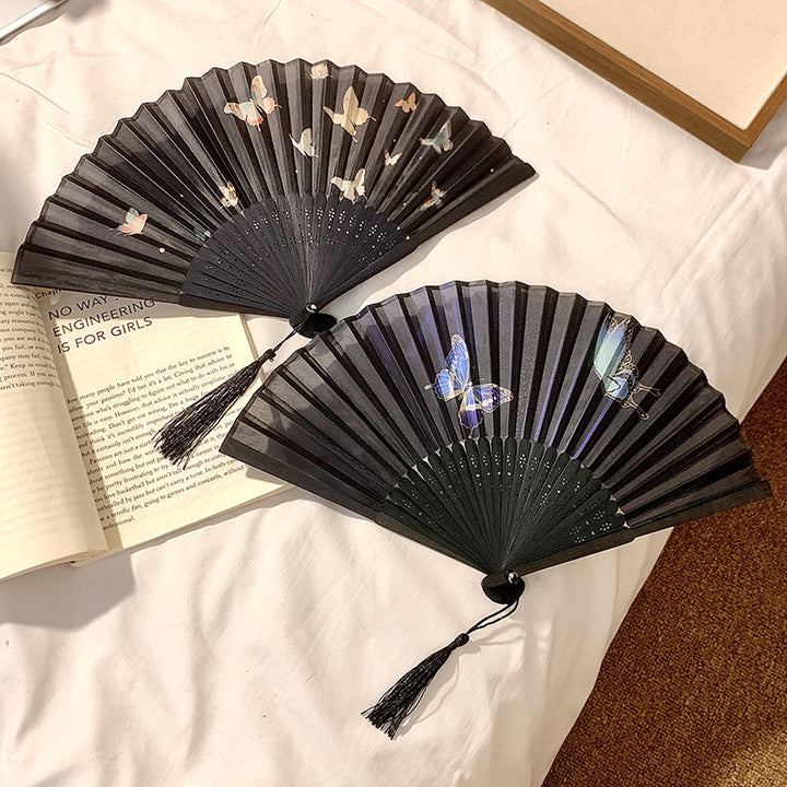Handcrafted fan with elegant butterfly design Stornfield
