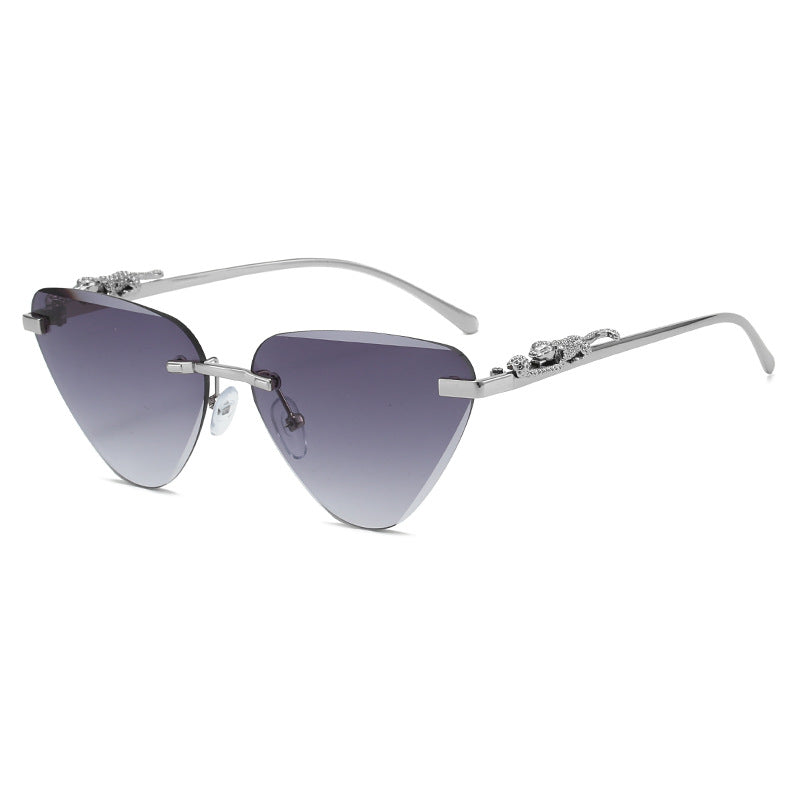 Women's Designer Sunglasses with Creative, Triangular Frame and Elegant Gold Accents Stornfield