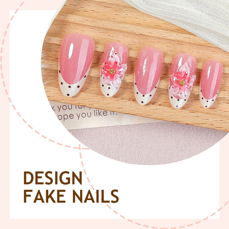 Nail art set with floral designs and glitter accents Stornfield