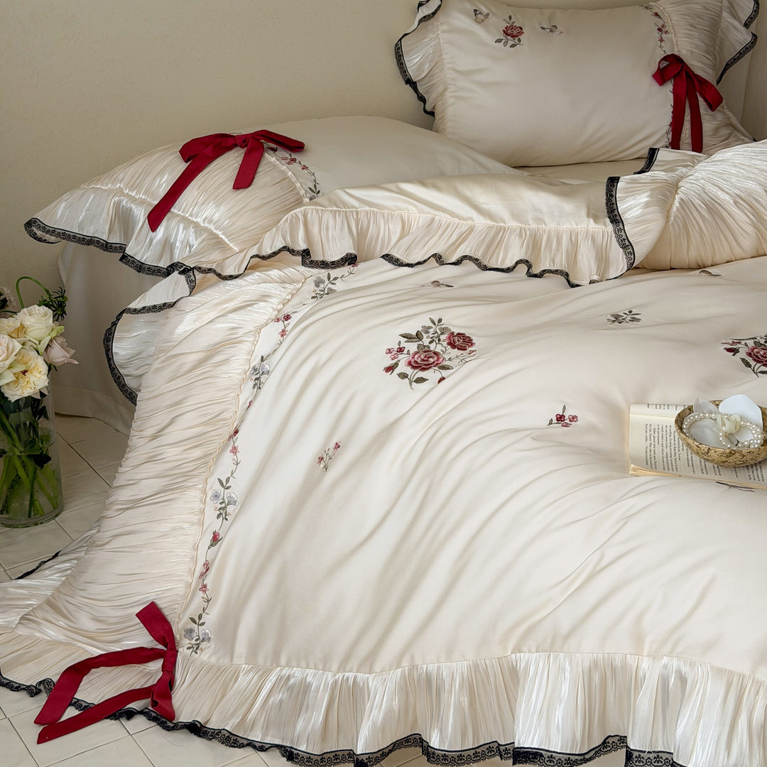 Exquisite cotton satin bedding set with floral embroidery, pleated ruffle and decorative bows