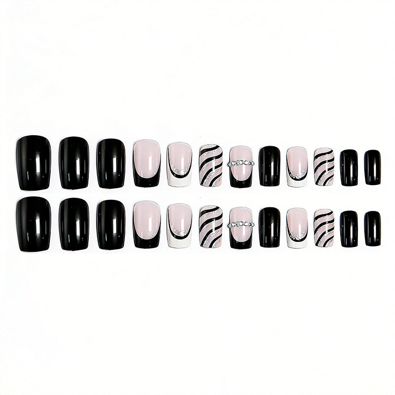 Artificial nail set with glamorous glitter and stripe designs Stornfield