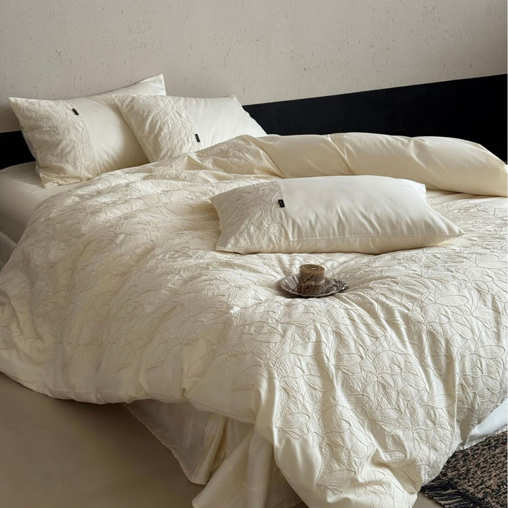 Luxurious cotton satin bedding set with embroidered leaf relief