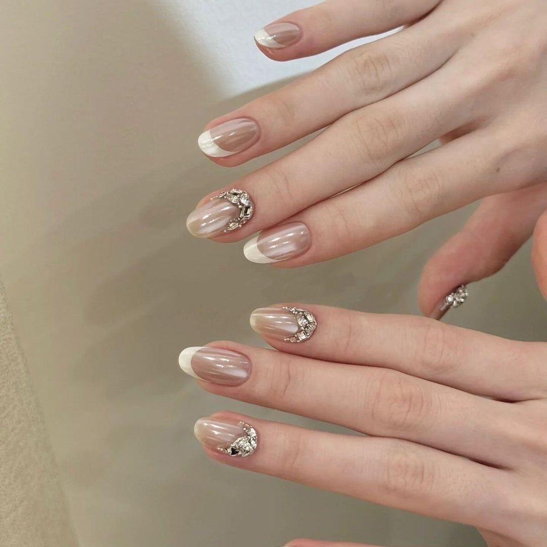 Glamorous artificial nails with elegant rhinestone decorations Stornfield