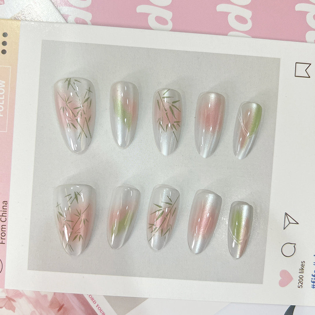 Artificial nail tips with elegant design and botanical accents Stornfield